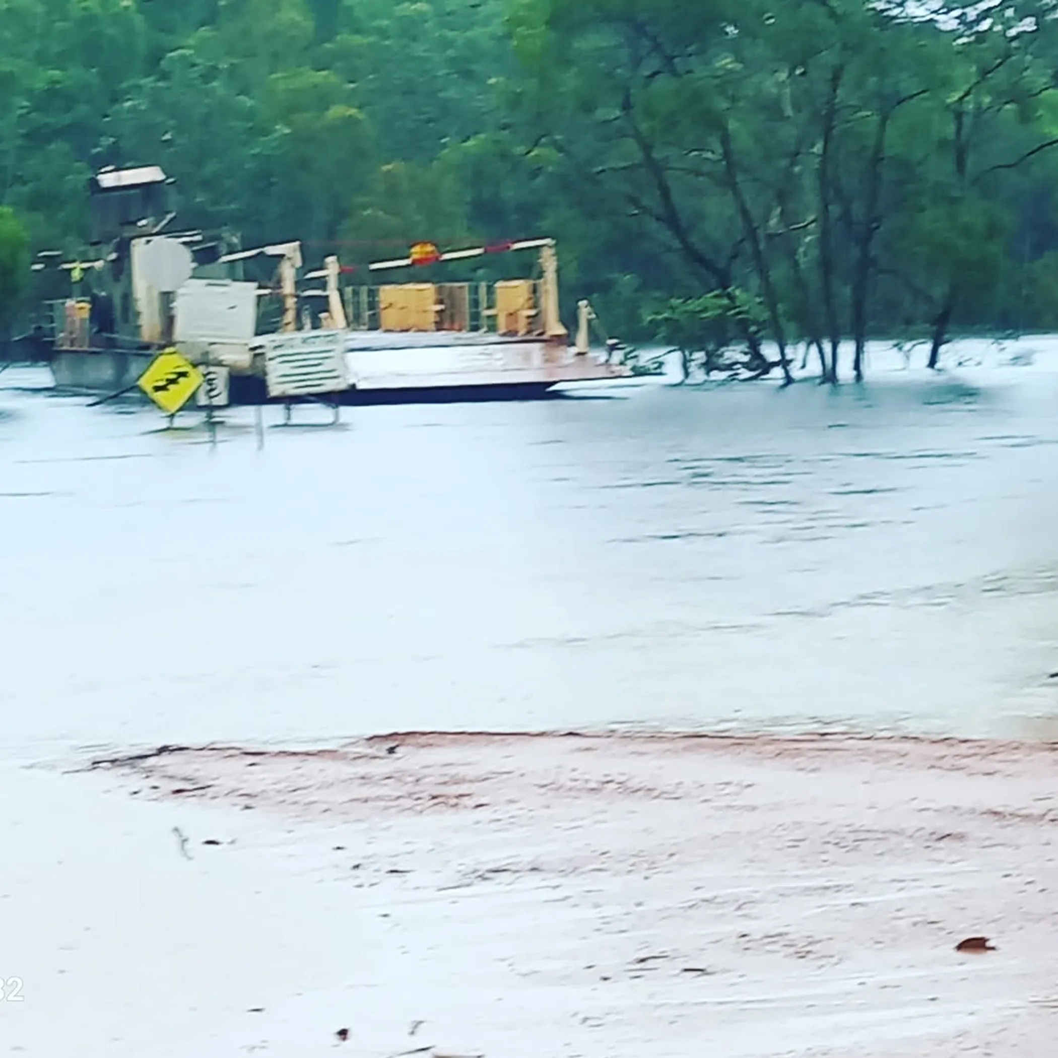 flooded ferry and road on cape york peninsula